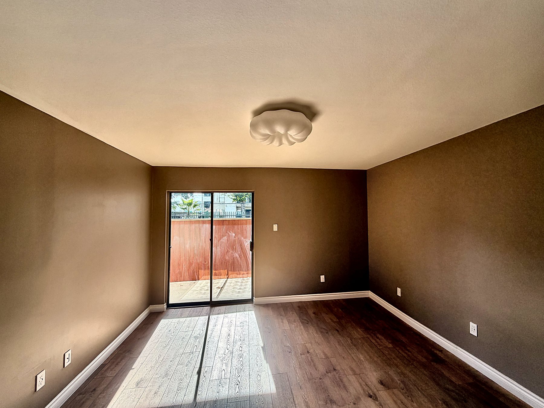 Main bedroom with sliding doors to the balcony