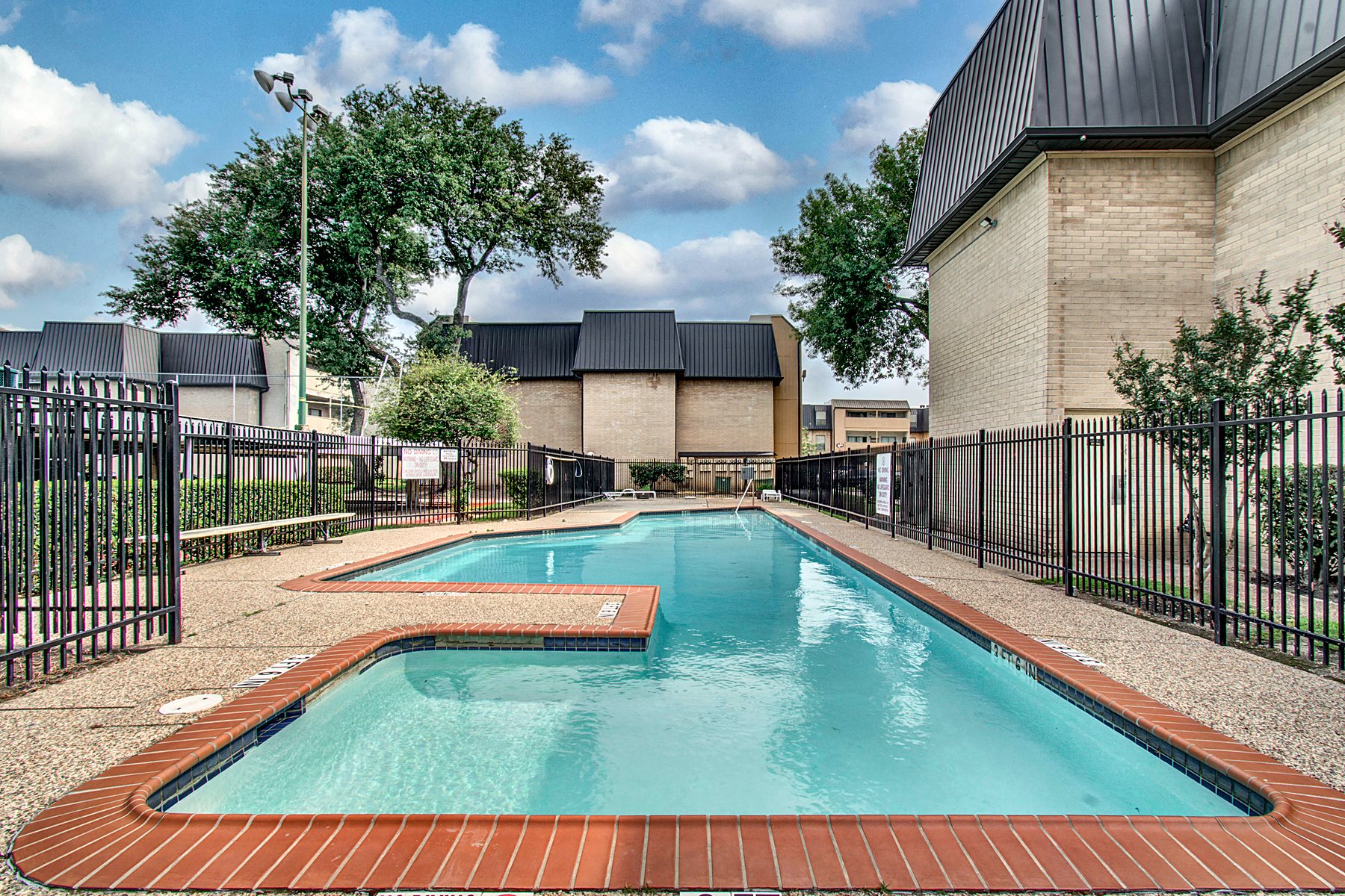 One of the two swimming pools in the gated community