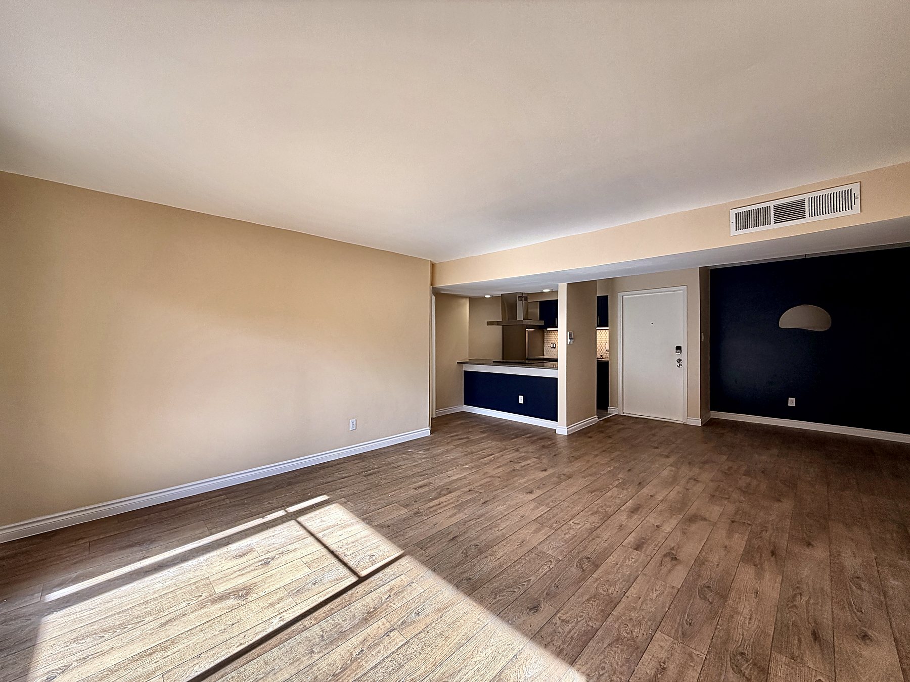 Open living and dining space looking toward the kitchen